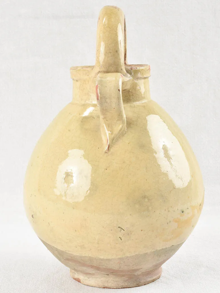 19th century terracotta water pitcher with yellow glaze 13½"