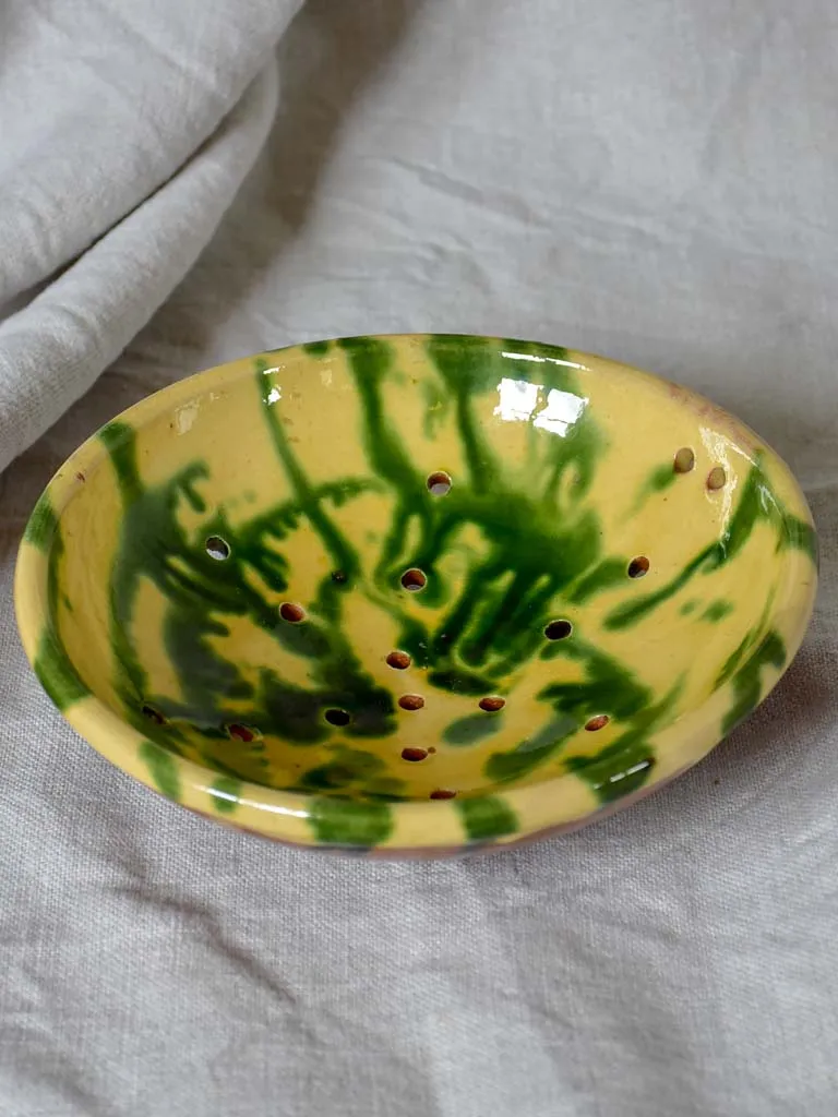 Vintage French strainer with green and yellow glaze