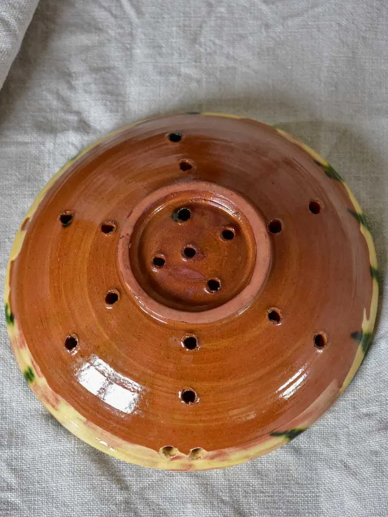 Vintage French strainer with green and yellow glaze