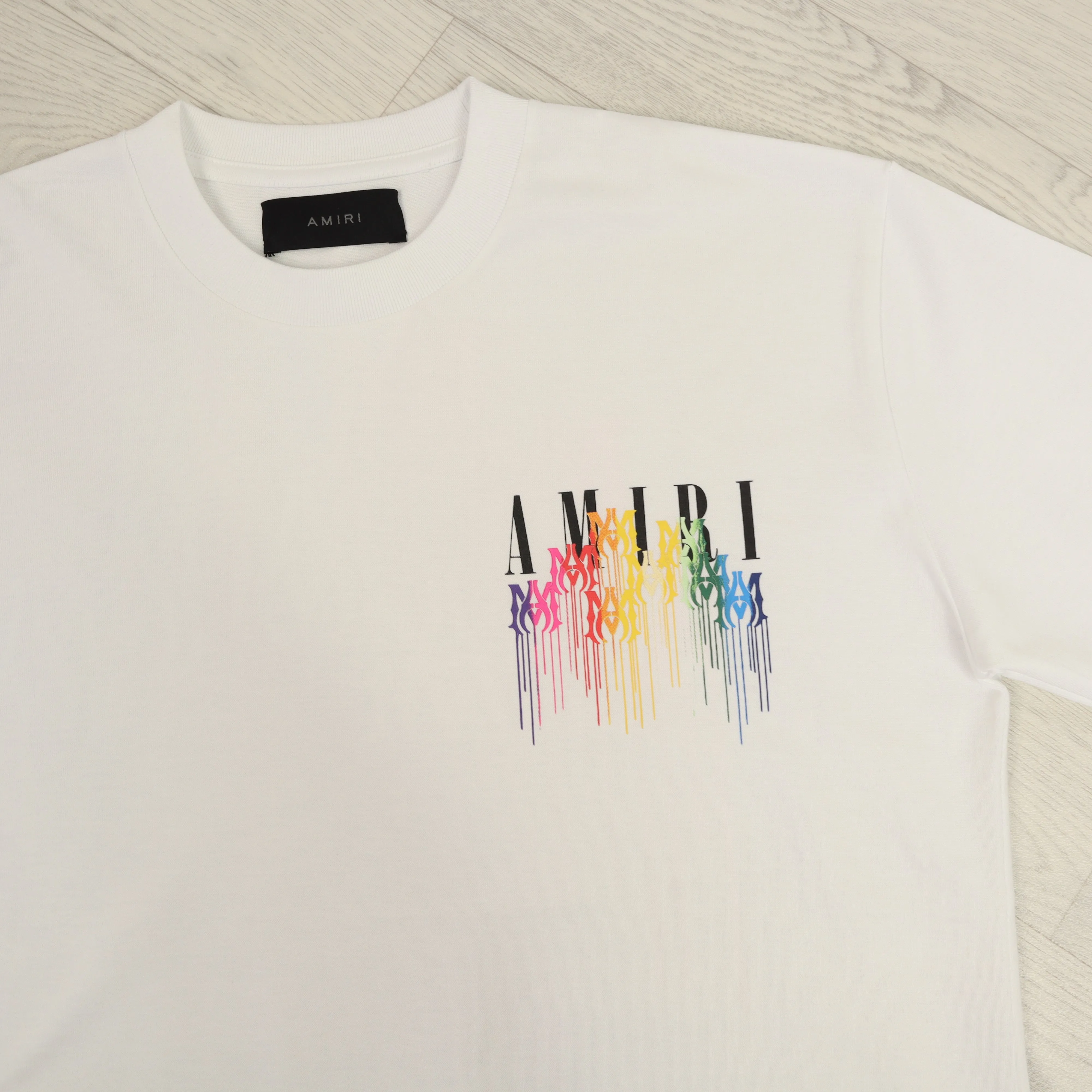 White AM Paint Drip T-Shirt.